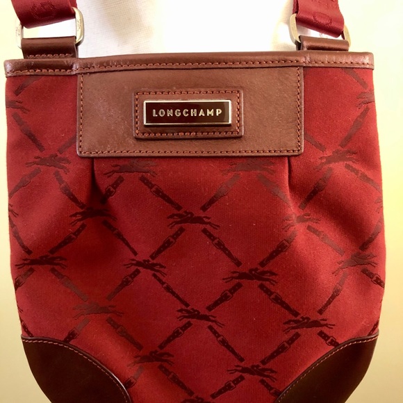Longchamp Handbags - Longchamp red fabric/leather crossbody bag purse